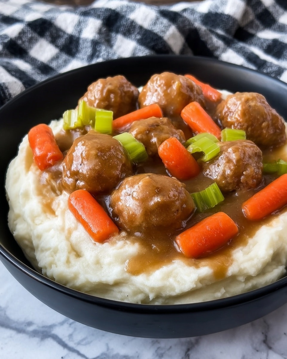 A white plate holds a dish with two main layers; the bottom layer is smooth, creamy white mashed potatoes with a soft, fluffy texture, topped by a thick brown gravy that covers several small, round meatballs, cooked baby carrots, and chopped celery pieces, all mixed together shiny and moist. The plate is placed on a white marbled surface with a black and white checkered cloth in the background. photo taken with an iphone --ar 4:5 --v 7