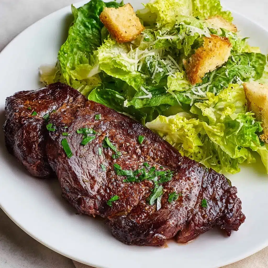 A white plate holds a cooked steak on the right side, with a dark brown, grilled surface showing juicy texture and a few green parsley leaves scattered on top. On the left side of the plate, there's a fresh green salad made of leafy romaine lettuce, light yellow shredded cheese, and golden brown croutons. The plate is set on a white marbled surface, and a fork is partially visible at the top right corner. photo taken with an iphone --ar 4:5 --v 7